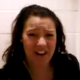 A brief, small, low-quality video clip of Mary Crap recording herself pooping while sitting on a toilet. She does not show her product when finished.